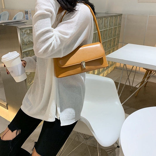 Alva - Vintage Baguette Schultertasche im Retro-Stil