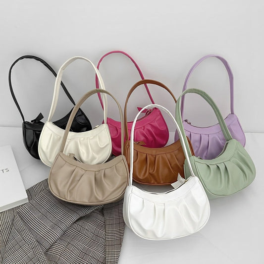 Alva - Kompakte Umhängetasche mit gefaltetem Reißverschluss